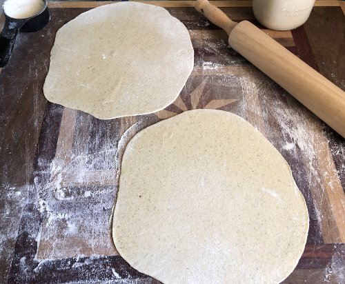 Flat dough on a floured board